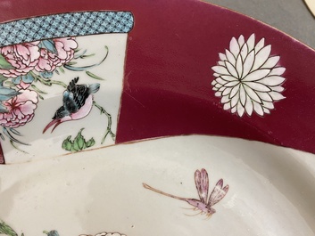 A pair of large Chinese famille rose ruby-ground 'rooster' dishes, Yongzheng