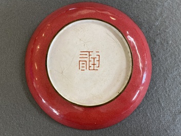 A Chinese Canton enamel 'flute players' dish with ruby edge on the back, Yongzheng