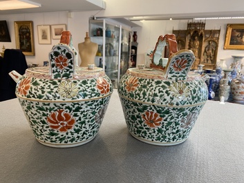 A pair of Chinese famille verte lime pots and covers, Kangxi