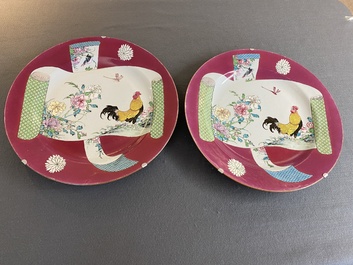 A pair of large Chinese famille rose ruby-ground 'rooster' dishes, Yongzheng