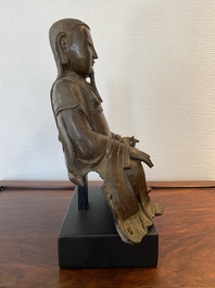 Een Chinese bronzen Zhen Wu met sporen van lakwerk, Ming