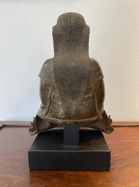 Een Chinese bronzen Zhen Wu met sporen van lakwerk, Ming