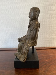 Een Chinese bronzen Zhen Wu met sporen van lakwerk, Ming