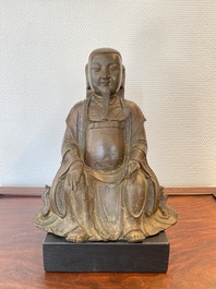 Een Chinese bronzen Zhen Wu met sporen van lakwerk, Ming