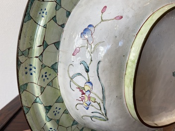 A large Chinese Canton enamel basin with garlands decorated with male heads, Qianlong