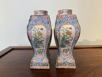 A pair of rare Chinese Canton enamel 'double eagle' vases, Yongzheng