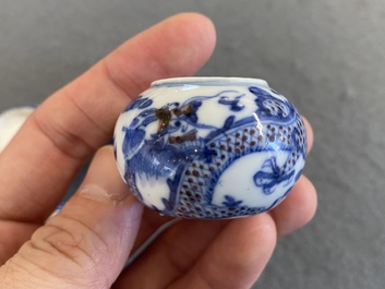 Four Chinese blue, white and copper-red bird feeders, 19th C.