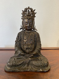 Een Chinese vergulde bronzen Boeddha, Ming