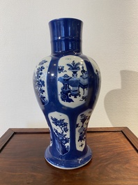 A Chinese powder-blue-ground 'antiquities' vase, Kangxi