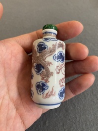 A Chinese blue, white and copper-red 'dragon' snuff bottle, Yongzheng mark, 19th C.