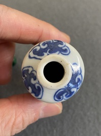 A Chinese blue, white and copper-red 'dragon' snuff bottle, Yongzheng mark, 19th C.