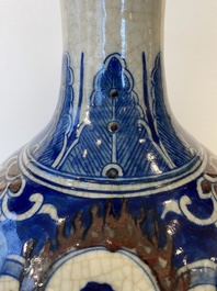 A Chinese blue, white and copper-red Nanking bottle vase, Yongzheng mark, 19/20th C.