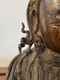 Een Chinese vergulde bronzen Boeddha, Ming