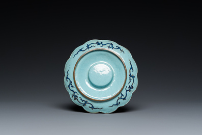 A Chinese green-ground Canton enamel cup on trembleuse stand, Qianlong