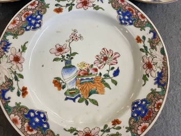 A Chinese famille rose dish and a pair of famille verte plates, Kangxi/Qianlong