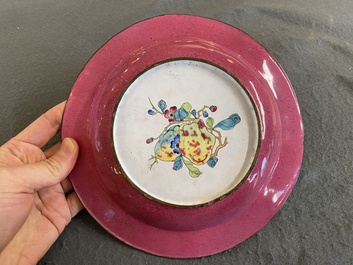 A Chinese 'ruby back' Canton enamel plate with a butterfly and a pheasant, Yongzheng