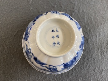 A Chinese blue and white bowl with figures in a landscape, Chenghua mark, Kangxi