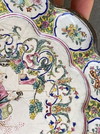 A lobed Chinese Canton enamel plate with a lady and two boys in a garden, Yongzheng