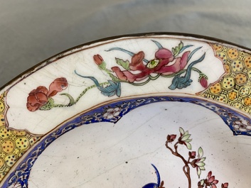 A Chinese 'ruby back' Canton enamel plate with a butterfly and a pheasant, Yongzheng