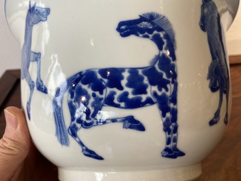A Chinese blue and white 'Eight horses of Mu Wang' jardini&egrave;re, Kangxi mark, 19/20th C.