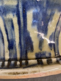 A Chinese blue and white 'guan' jar with lotus scrolls, Ming