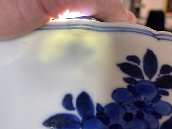 A Chinese blue and white dish with floral design, Kangxi mark and of the period