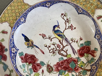 A Chinese 'ruby back' Canton enamel plate with a butterfly and a pheasant, Yongzheng