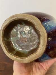 A Chinese flamb&eacute;-glazed 'hu' vase, Qianlong mark, 19/20th C.