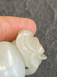 A Chinese celadon jade sculpture of a boy with a cat, Qing