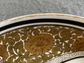 A Chinese grisaille and gilt-decorated 'ruby back' plate, Yongzheng mark, 19/20th C.