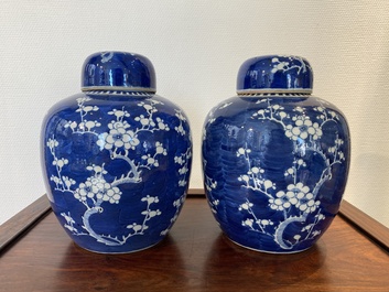A pair of Chinese blue and white jars and covers, 19th C.
