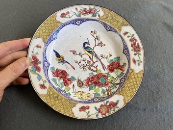 A Chinese 'ruby back' Canton enamel plate with a butterfly and a pheasant, Yongzheng