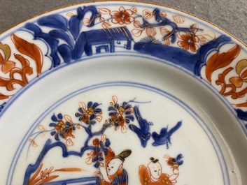 A pair of Chinese Imari-style 'lady with two boys' plates, Kangxi