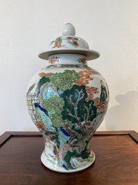 A Chinese famille verte vase and cover, 19th C.