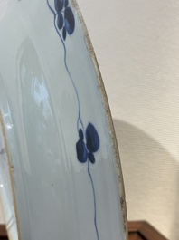 A Chinese Dutch market blue and white armorial dish with the arms of 'Pelgrom', Kangxi