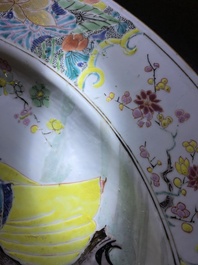 A large Chinese famille rose 'ladies and peacocks' dish, Yongzheng