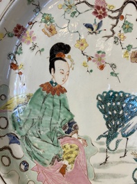 A large Chinese famille rose 'ladies and peacocks' dish, Yongzheng