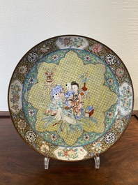 A Chinese Canton enamel dish with a lady and two boys, Yongzheng
