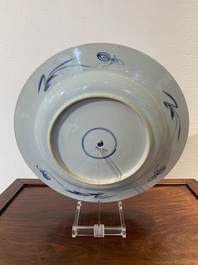 A Chinese blue and white dish with applied gilt and iron-red accents, Yongzheng