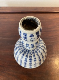 A Chinese blue and white inscribed candlestick, Jin Yu Zhu Ji 金玉珠記 mark, 19th C.