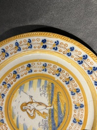 A blue, white and yellow Dutch Delft 'putto' dish, Verstraeten workshop, Haarlem, ca. 1640-1660