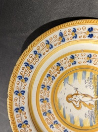 A blue, white and yellow Dutch Delft 'putto' dish, Verstraeten workshop, Haarlem, ca. 1640-1660