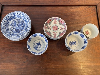 Twelve Chinese blue, white and famille rose cups and saucers, Kangxi/Yongzheng