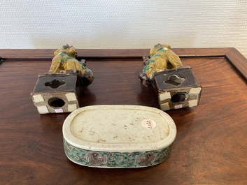 A pair of Chinese sancai incense stick holders and a verte biscuit inkstone, Kangxi or later