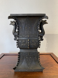 A Chinese partly gilt bronze archaistic inscribed 'fangzun' vase, 19/20th C.