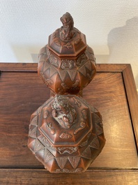 An extremely rare pair of Chinese Yixing stoneware octagonal vases and covers, Kangxi