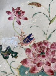 Een grote Chinese famille rose 'lotus' schotel met reli&euml;fdecor, Yongzheng/Qianlong