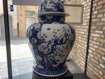 An exceptionally large pair of Chinese blue and white vases and covers, 19/20th C.