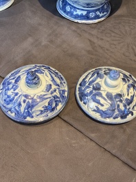 A pair of Chinese blue and white vases and covers with figurative design, Ming
