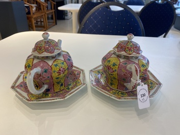 A pair of Chinese octagonal famille rose teapots on stands, Yongzheng